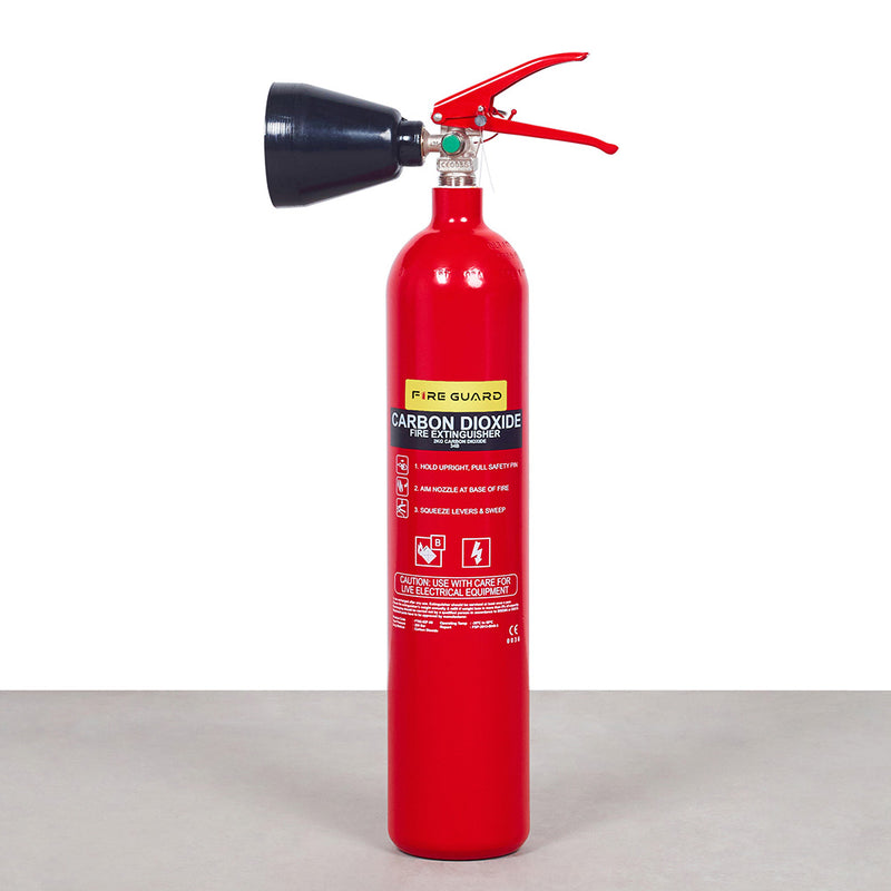 A red 2KG CO2 fire extinguisher with a black horn-shaped nozzle and a green label that includes instructions - fire guard