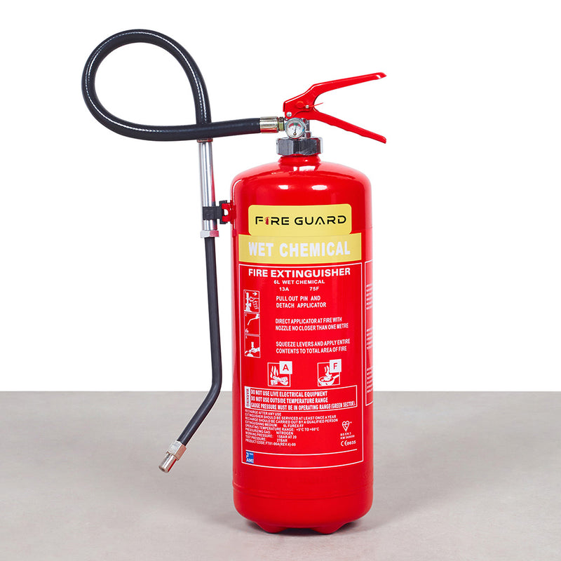 A red 6 Litre Wet Chemical Fire Extinguisher with a hose and a red nozzle, labeled for Class A & F with the brand 'Fire Guard'
