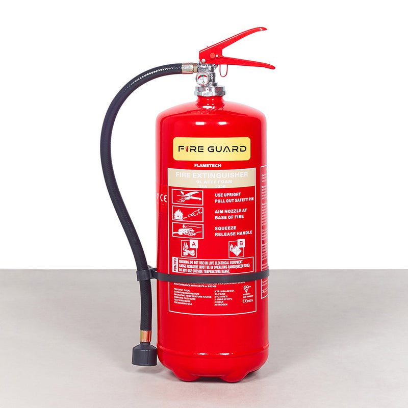 A red 9L Foam Marine Cartridge Fire Extinguisher with a black discharge hose and nozzle, standing upright on a neutral background - fire guard