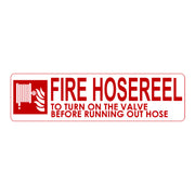 A red and white fire hose reel signage with text and a pictogram illustrating the action of turning on the valve before running out of hose.