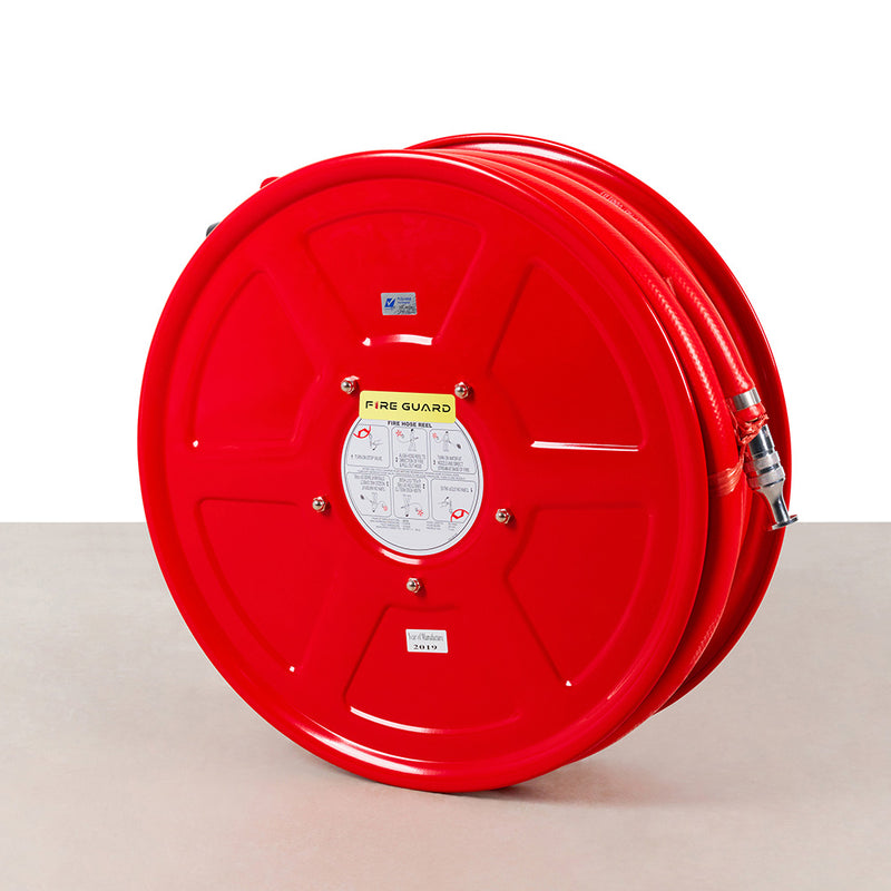 A red fire hose reel with a metallic nozzle - fire guard