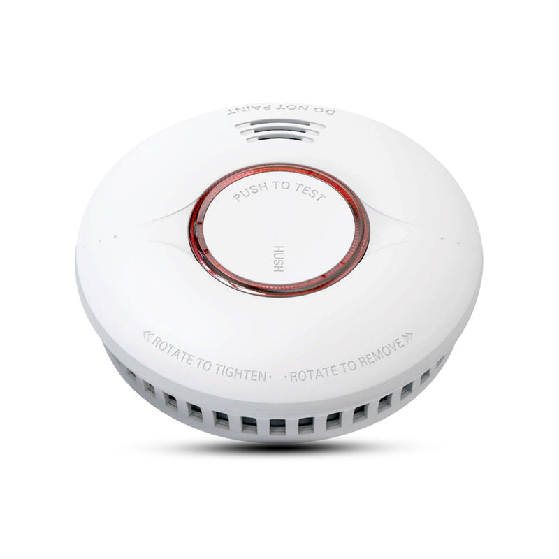A white, ceiling-mounted smoke detector with a red test button, and a label indicating a 10-year non-replaceable battery.