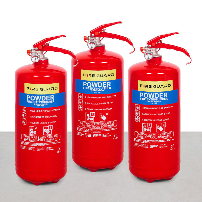 A set of three red fire extinguishers with a label indicating 'Fire Guard Powder' and a fire extinguisher wall bracket