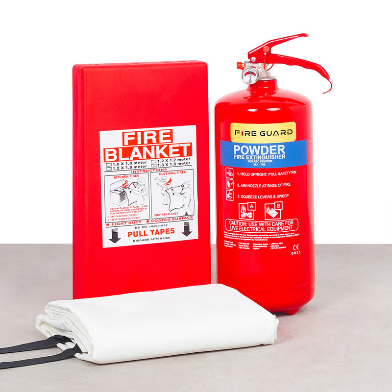A red fire blanket and a red 3kg dry powder fire extinguisher with a wall bracket, both labeled 'FIRE GUARD'.