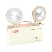 A SAMCOM emergency LED light with twin lamps, featuring a white casing with emergency light labeling and an adjustable angle projection lamp - fire guard