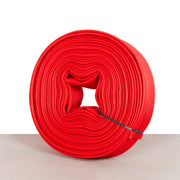 A rolled up red fire hose with a 52mm diameter, made of high tenacity polyester yarn, with synthetic rubber  - fire guard