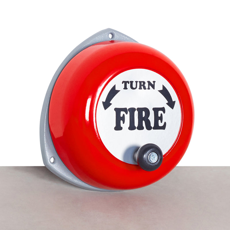 A red manual rotate fire alarm bell with a gray center and a black switch - fire guard